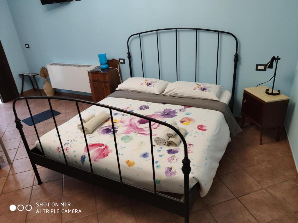 Postel nebo postele na pokoji v ubytování Borgo Lamurese
