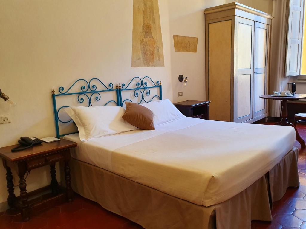 Postel nebo postele na pokoji v ubytování Hotel Annalena