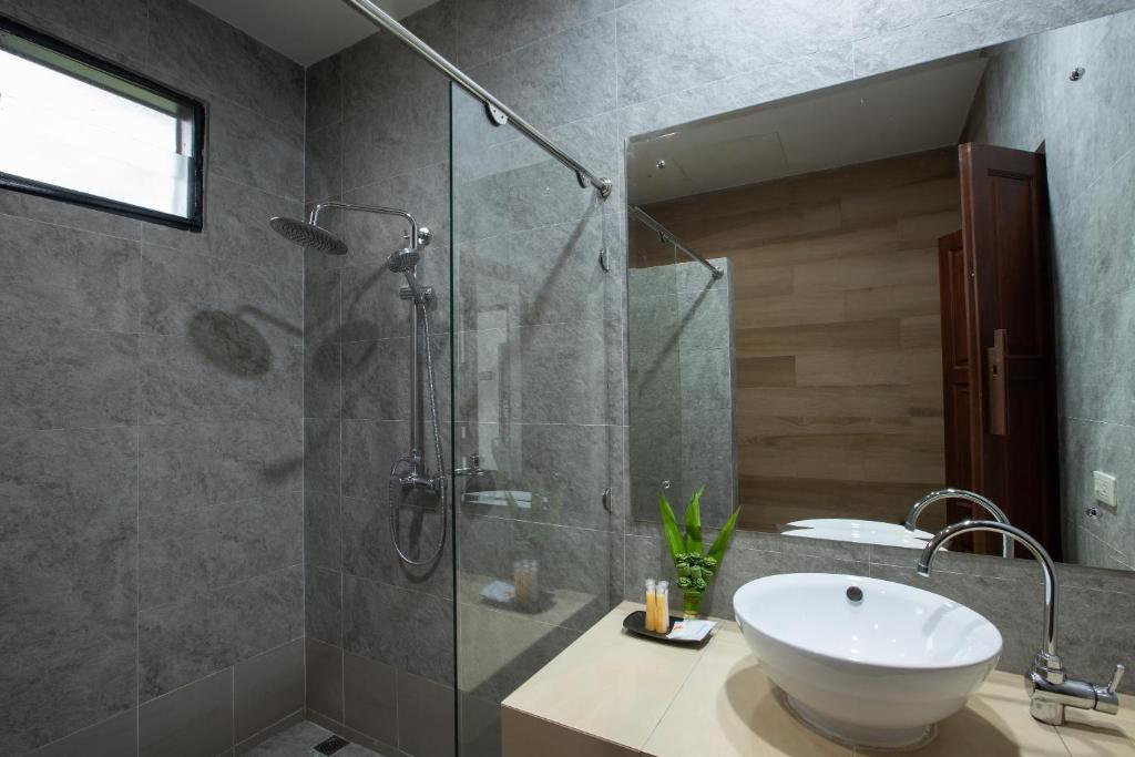 Koupelna v ubytování Pimann Inn Hotel