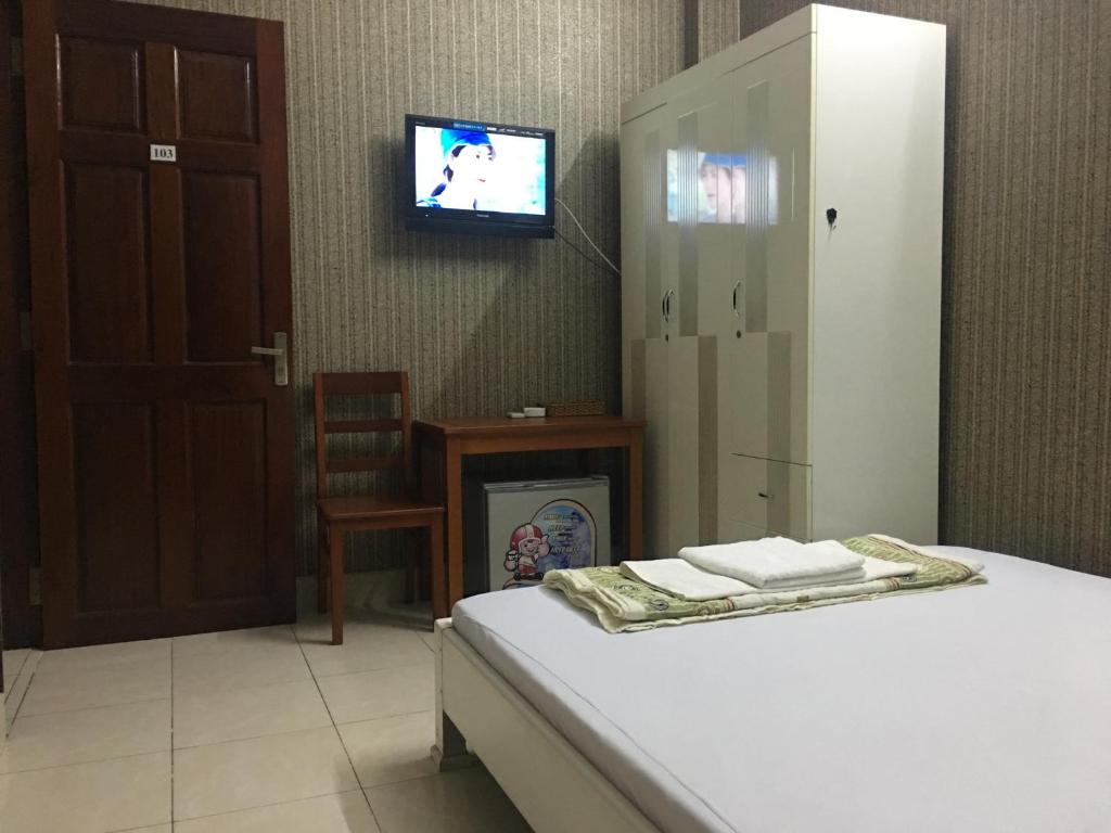 Postel nebo postele na pokoji v ubytování Thu Đô Motel