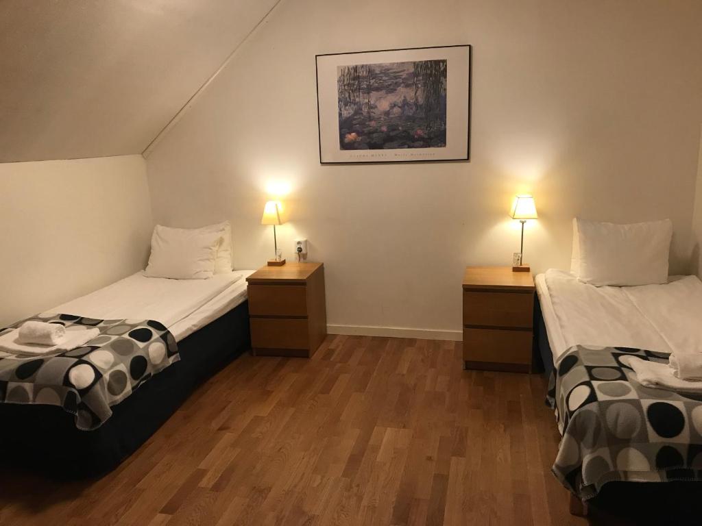 Postel nebo postele na pokoji v ubytování Port Hotel