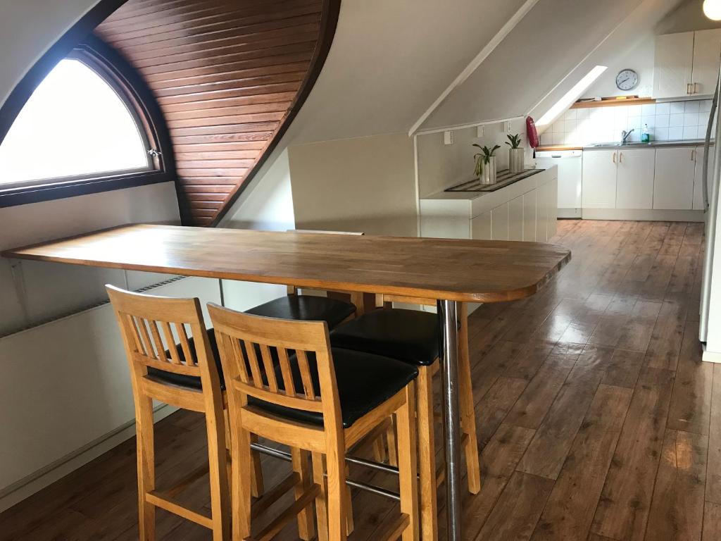 Kuchyň nebo kuchyňský kout v ubytování Port Hotel