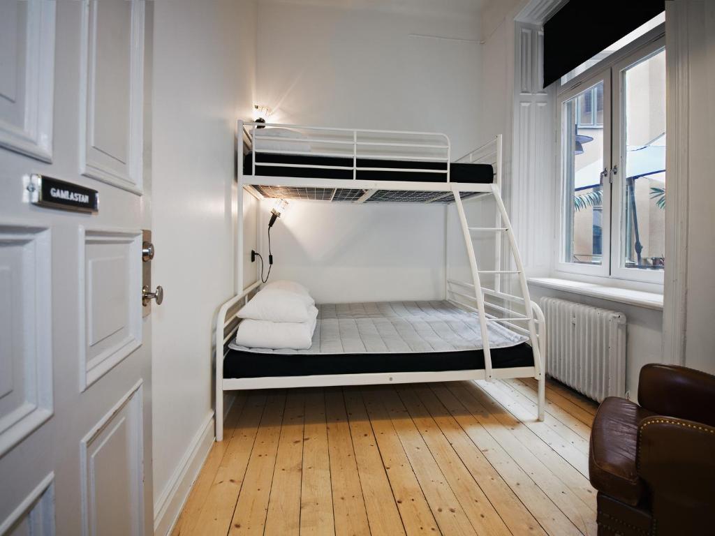 a room with a bunk bed in a room at City Backpackers Hostel in Stockholm