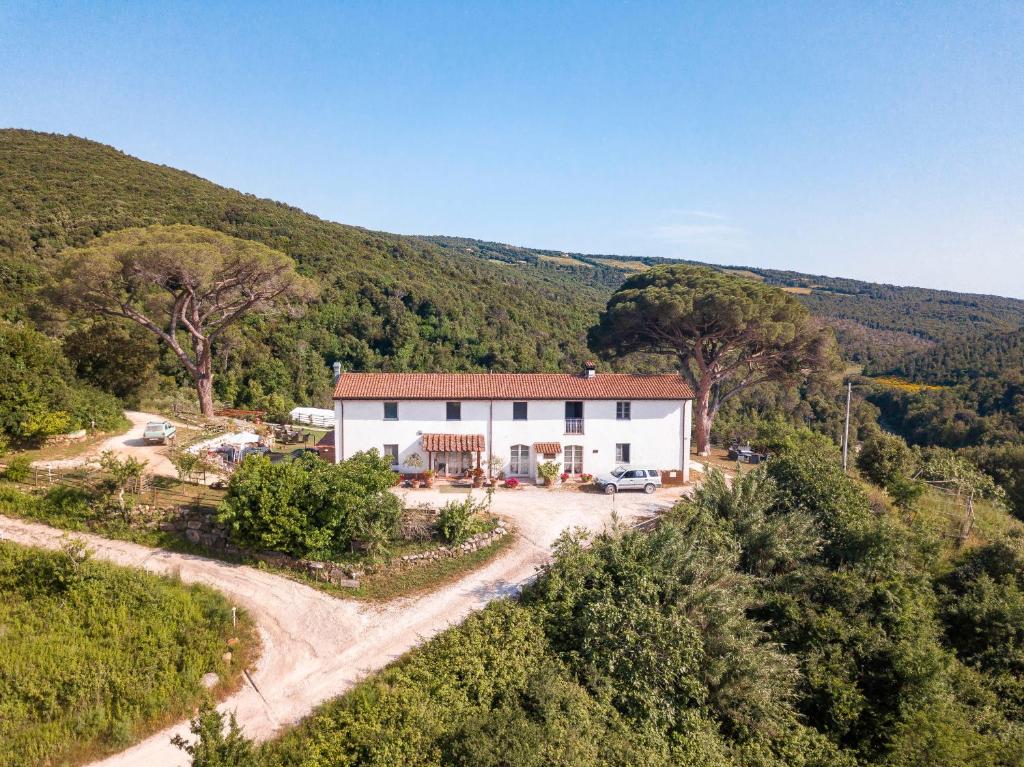 an aerial view of a house in the hills at Agriturismo La Mignola in Quercianella
