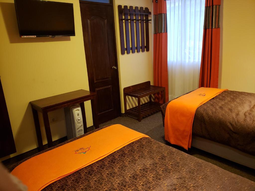 Postel nebo postele na pokoji v ubytování Vita Hoteles Colca