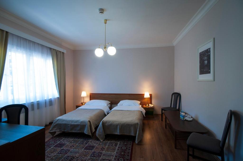 Posteľ alebo postele v izbe v ubytovaní Art Deco Hotel Hoffmann