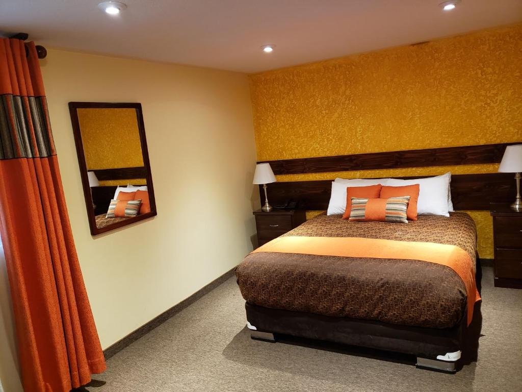 Postel nebo postele na pokoji v ubytování Vita Hoteles Colca