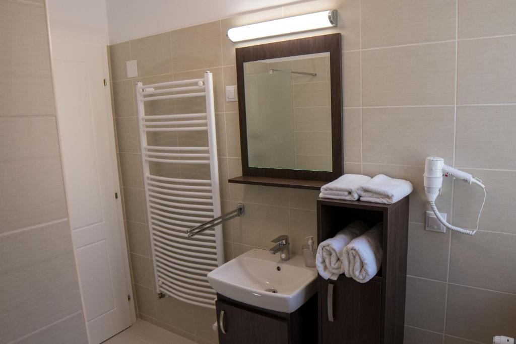 Koupelna v ubytování Mecset Apartman