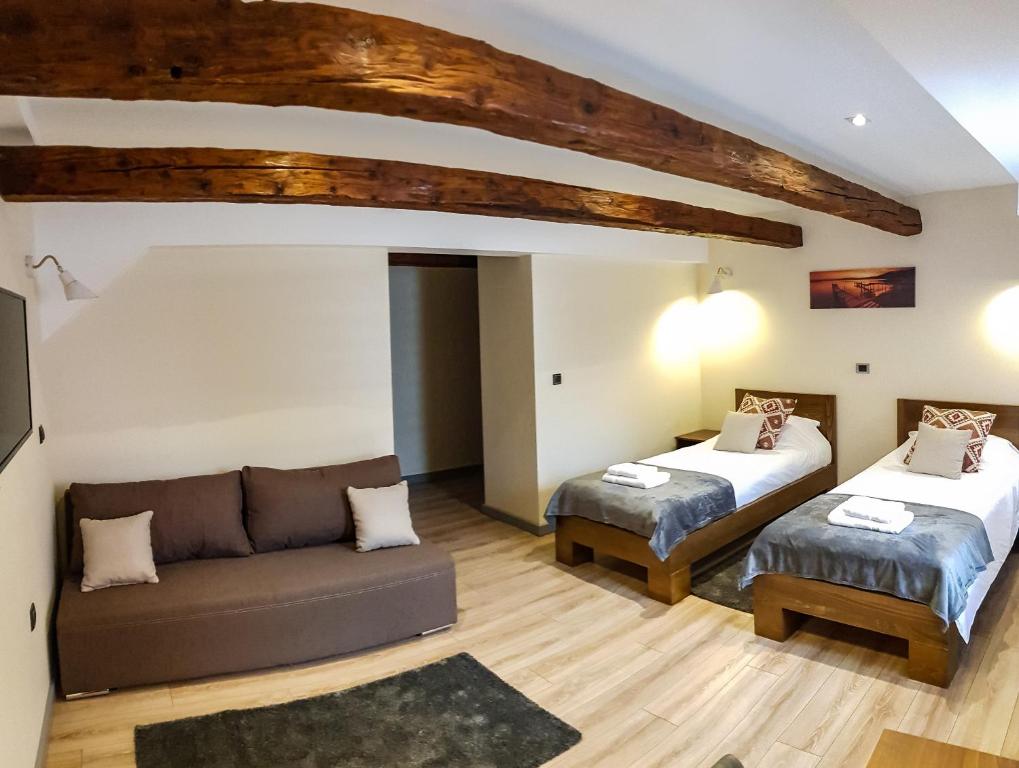 Кровать или кровати в номере Stari Slon