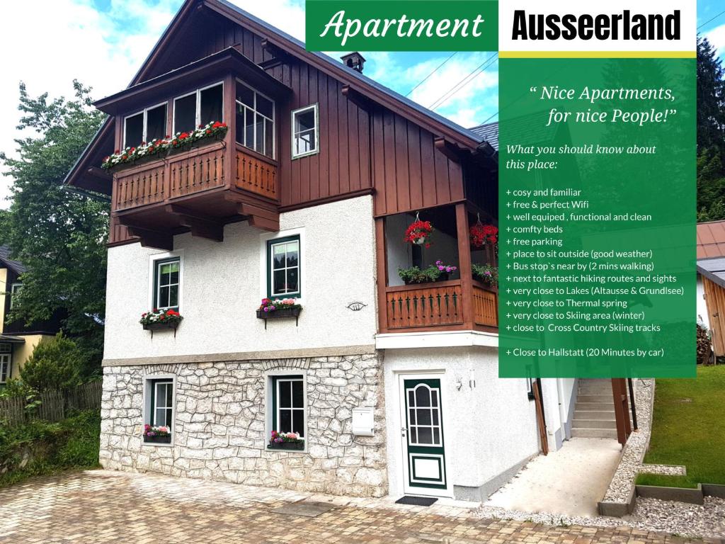 eine Anzeige für ein Haus mit Balkon in der Unterkunft Apartment Ausseerland - willkommen bei Freunden in Bad Aussee