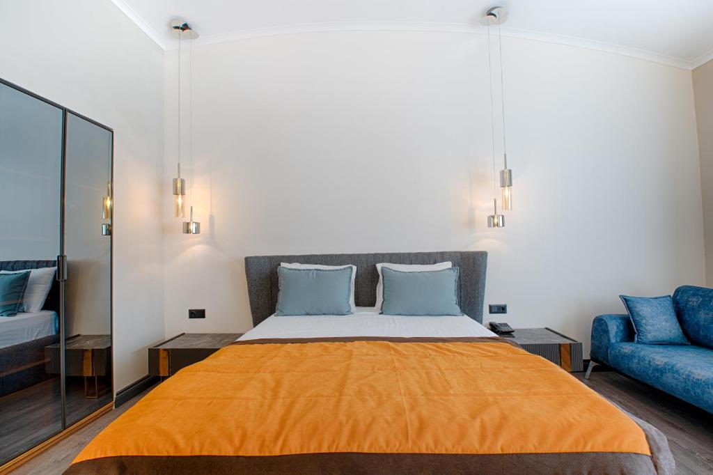Postel nebo postele na pokoji v ubytování Mendos Garden Exclusive Hotel Fethiye