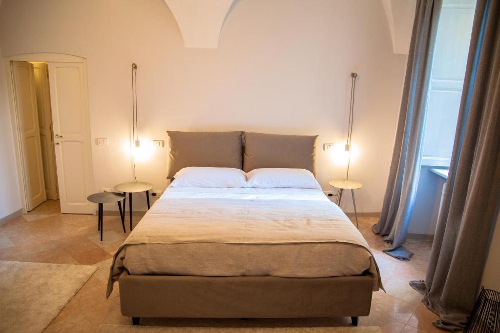 A bed or beds in a room at R&B Il Viavai