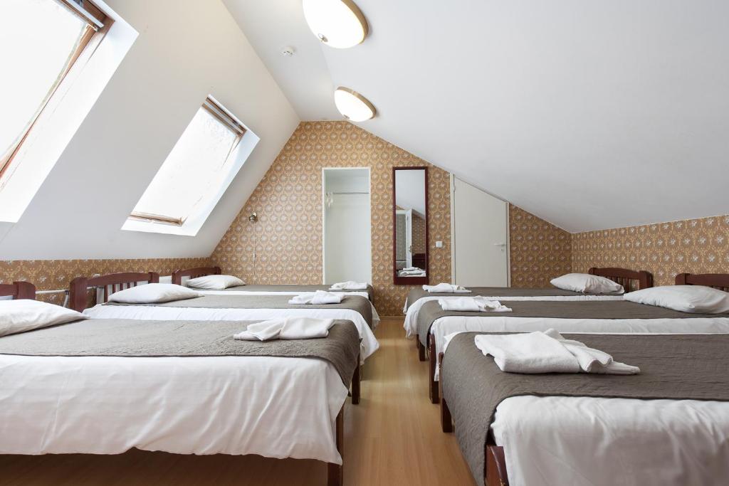 Postel nebo postele na pokoji v ubytování Humala Guest House