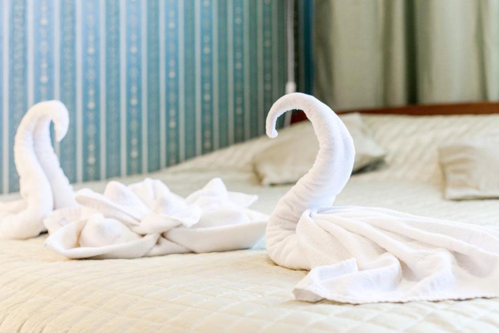 Postel nebo postele na pokoji v ubytování Humala Guest House