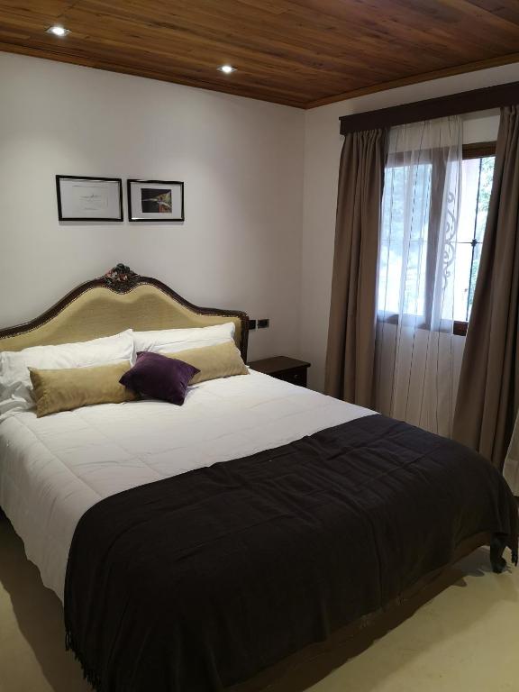 Postel nebo postele na pokoji v ubytování Rincón Escondido B&B
