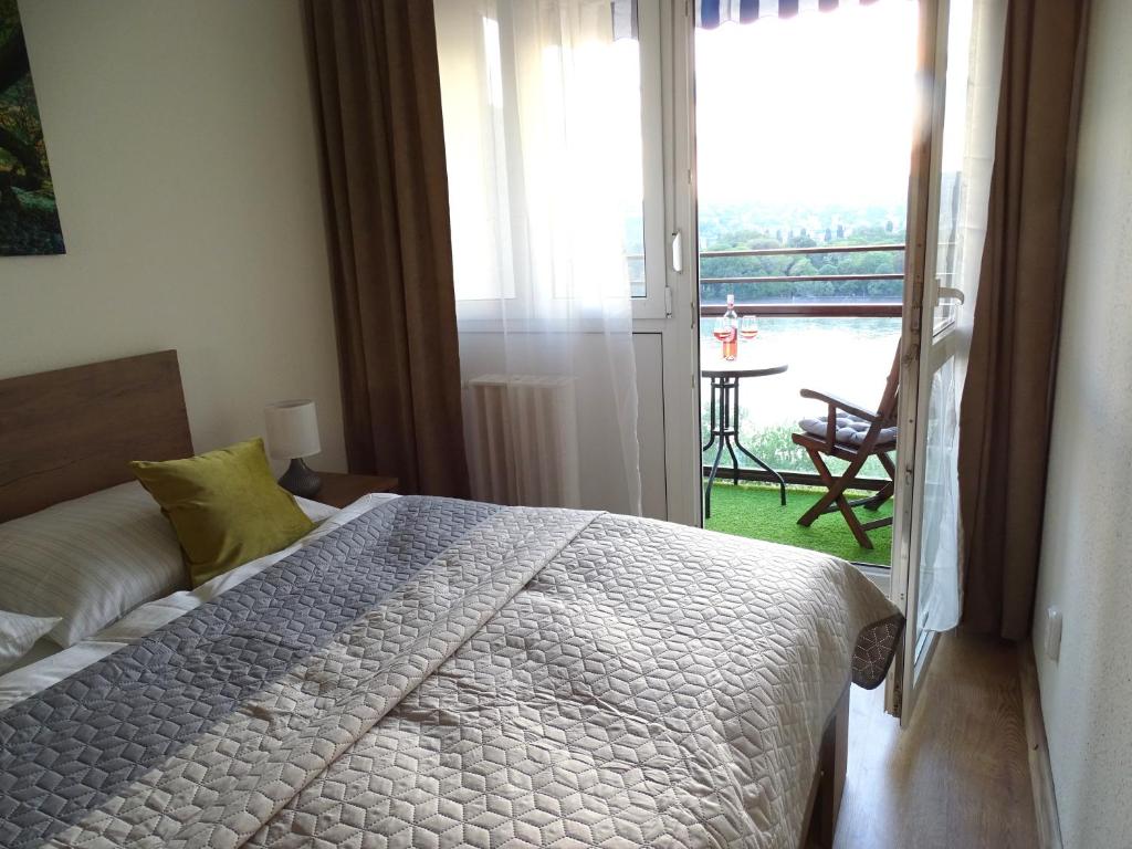 Postel nebo postele na pokoji v ubytování Duna View Apartment