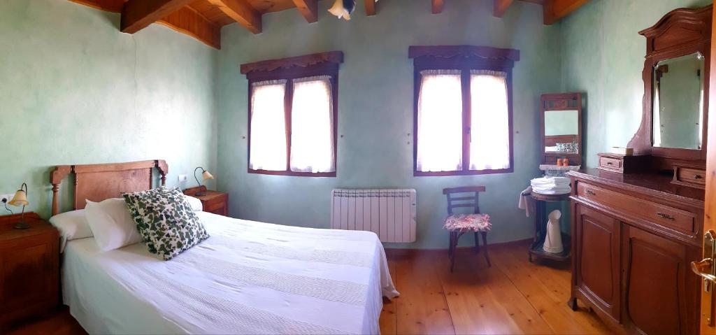 Postel nebo postele na pokoji v ubytování La Casina de Terobe