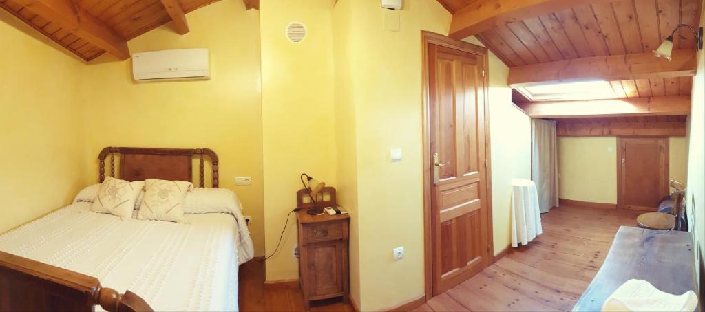 Postel nebo postele na pokoji v ubytování La Casina de Terobe