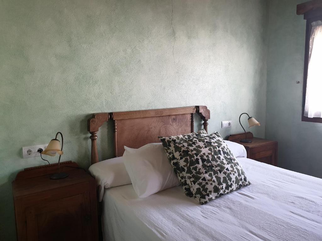 Postel nebo postele na pokoji v ubytování La Casina de Terobe