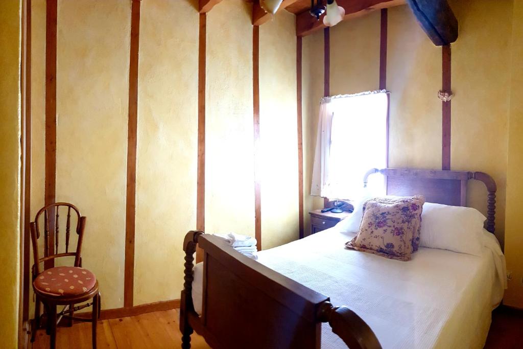 Postel nebo postele na pokoji v ubytování La Casina de Terobe