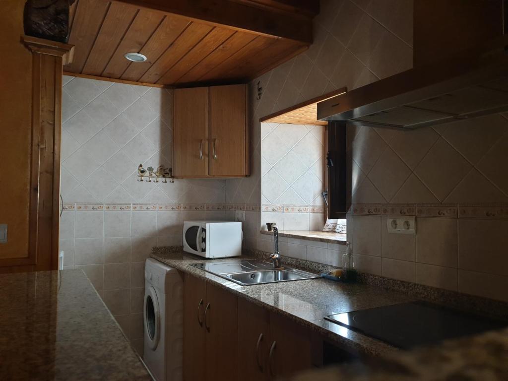 Kuchyň nebo kuchyňský kout v ubytování La Casina de Terobe