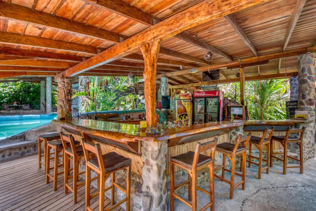 Bazén v ubytování Omega Tours Eco-Jungle Lodge nebo v jeho okolí