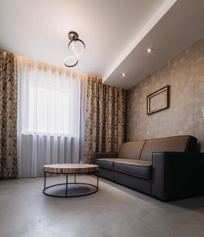 Posezení v ubytování VILLA BRICOLA - Boutique Apartments
