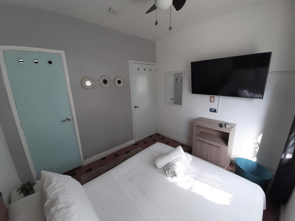 Postel nebo postele na pokoji v ubytování Noah boutique hostels Medellín