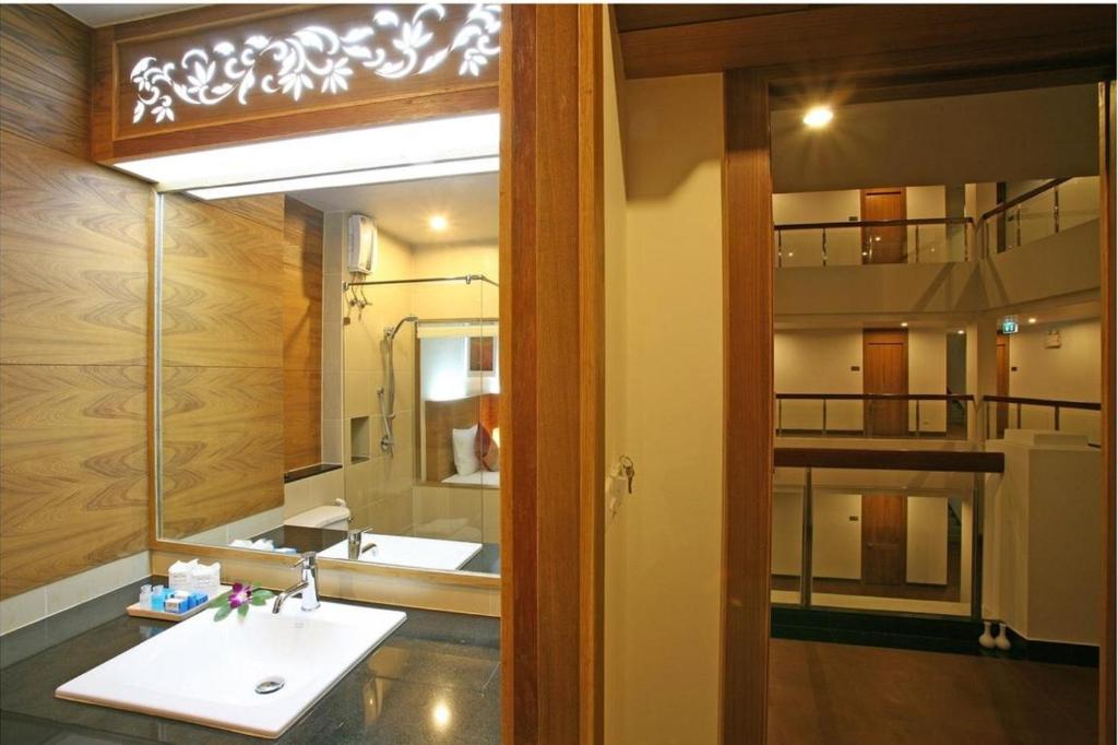 Koupelna v ubytování Baan Saikao Plaza Hotel & Service Apartment