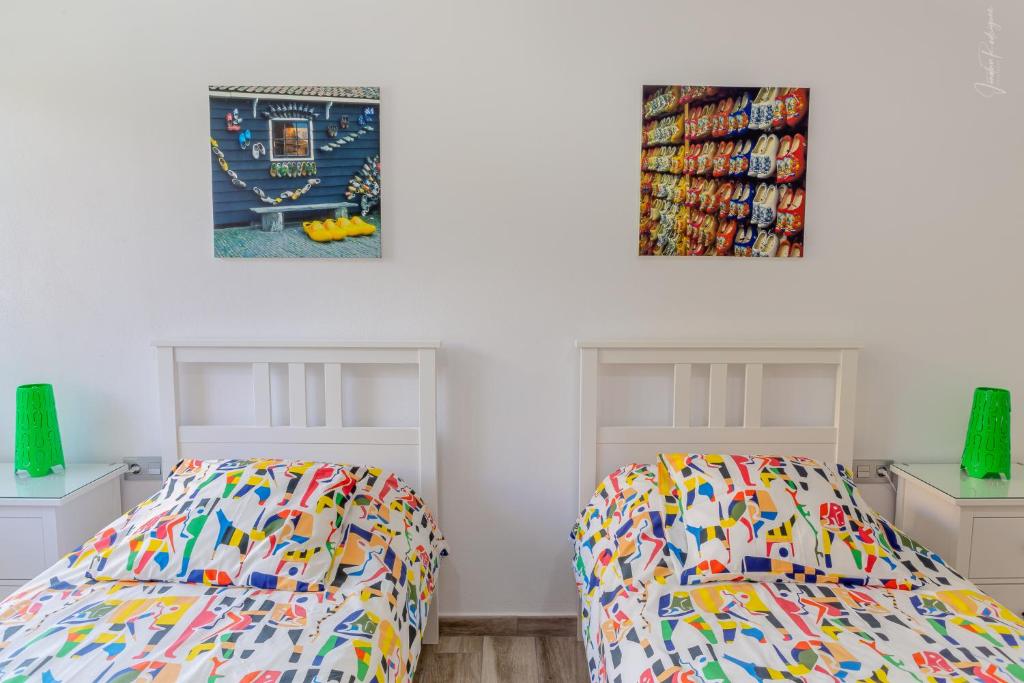 Postel nebo postele na pokoji v ubytování Apartamentos Los Laureles