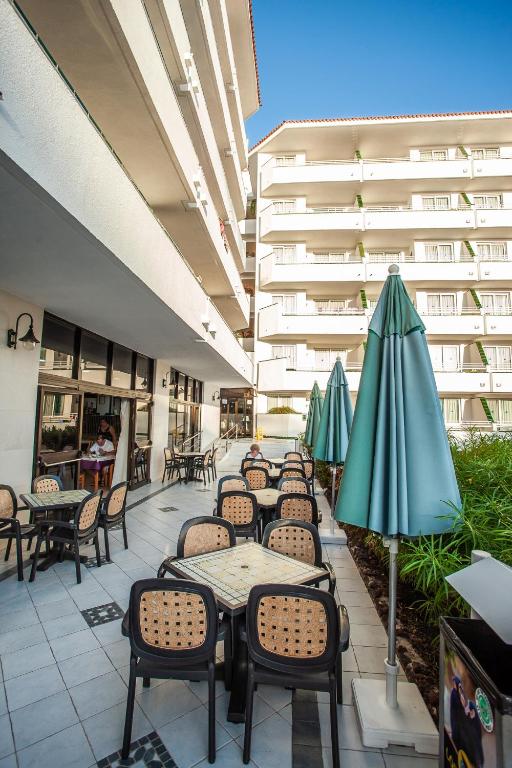 A balcony or terrace at Spectacular Renovated Apartment, 5 min to Camison Beach, with AirCon