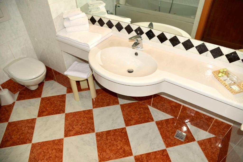 Koupelna v ubytování Hotel Amadeus E Teatro