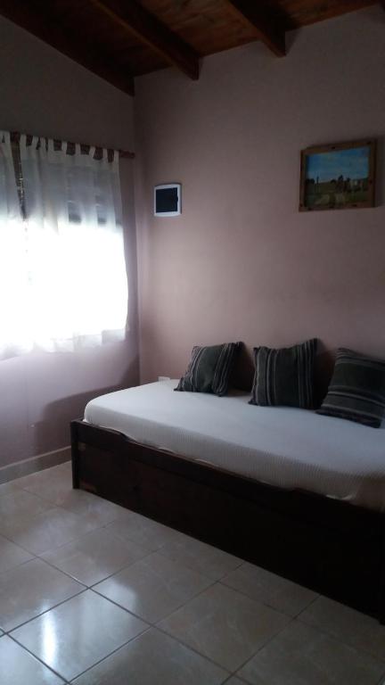 Postel nebo postele na pokoji v ubytování Nuestro Sueño