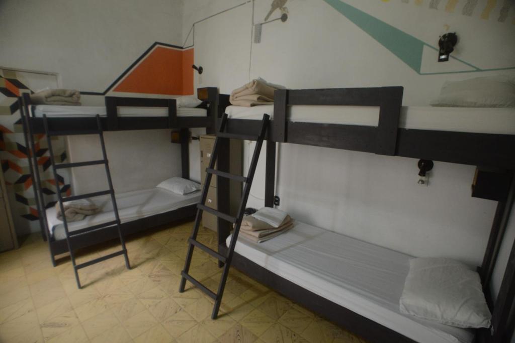Postel nebo postele na pokoji v ubytování El Petate Hostel