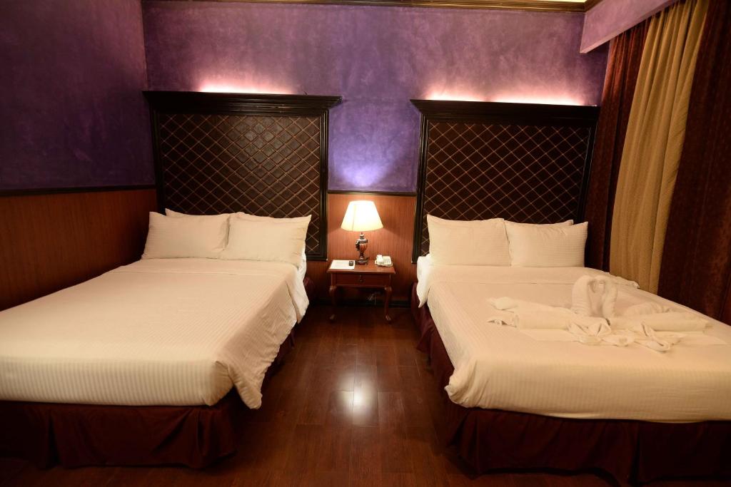 Postel nebo postele na pokoji v ubytování Hotel San Marco