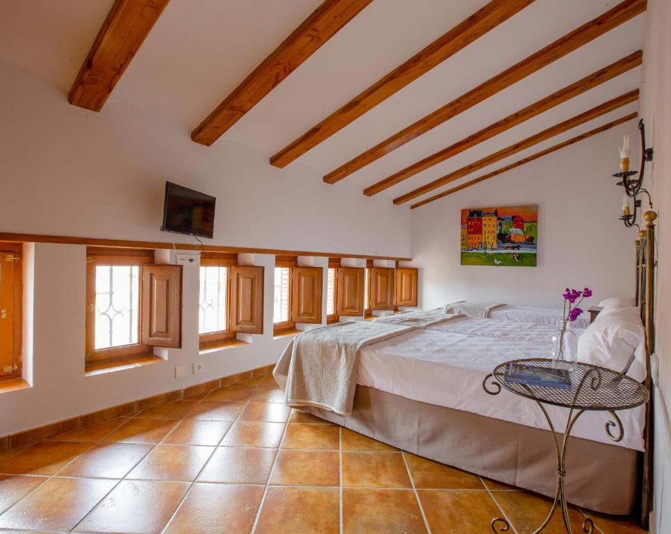 Postel nebo postele na pokoji v ubytování Hotel Jaime I