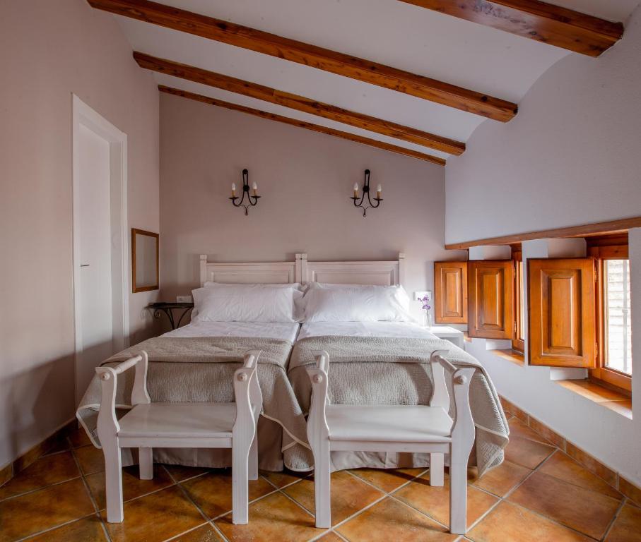 Postel nebo postele na pokoji v ubytování Hotel Jaime I