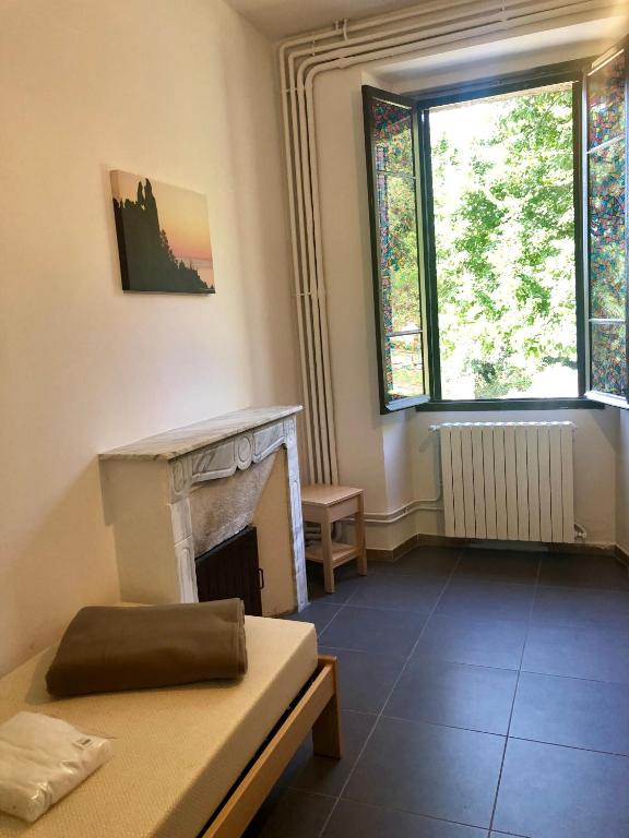 Postel nebo postele na pokoji v ubytování U Castellu