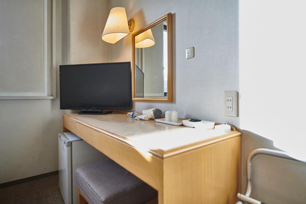 TV a/nebo společenská místnost v ubytování Hotel Select Inn Isehara