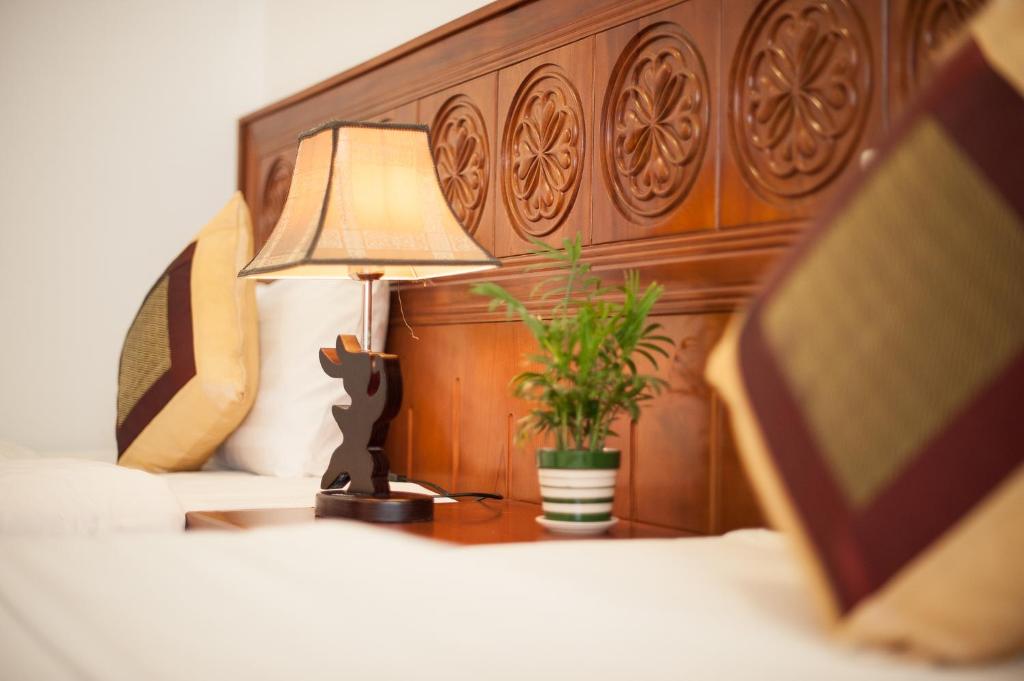 Postel nebo postele na pokoji v ubytování Lefoyer Hotel