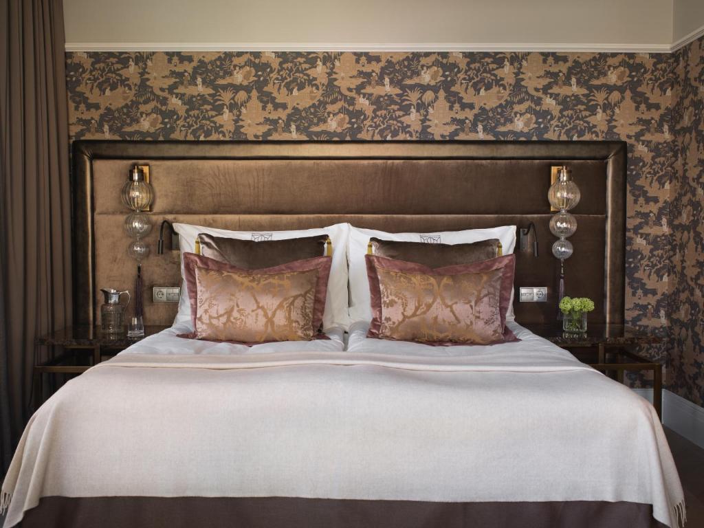 Postel nebo postele na pokoji v ubytování Britannia Hotel