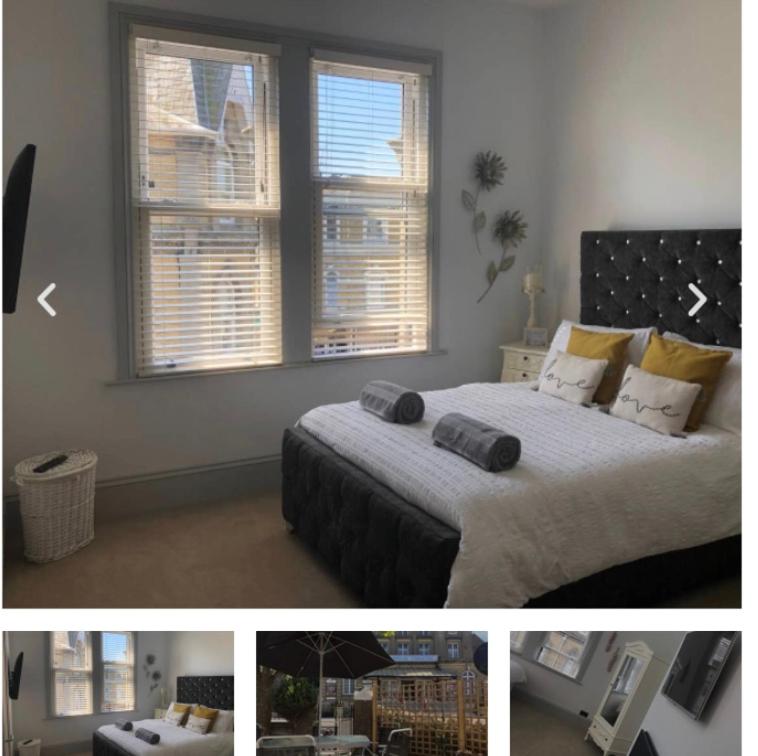 two pictures of a bedroom with a bed and windows at PENTHOUSE in Shanklin