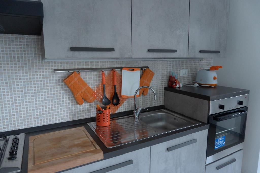 Kuchyň nebo kuchyňský kout v ubytování Griante suites