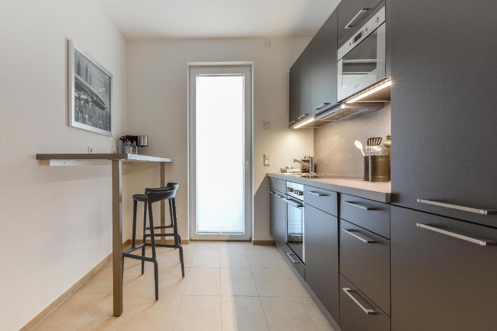 Kuchyň nebo kuchyňský kout v ubytování Lunas Appartements Essen