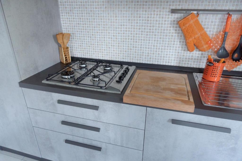 Kuchyň nebo kuchyňský kout v ubytování Griante suites