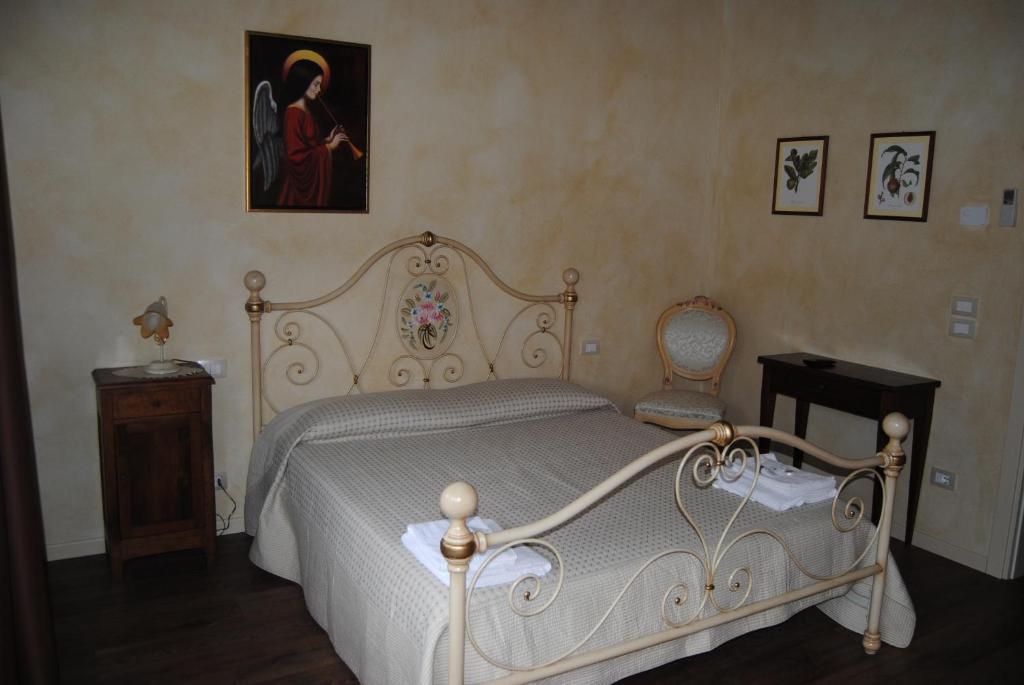 Łóżko lub łóżka w pokoju w obiekcie I Filari