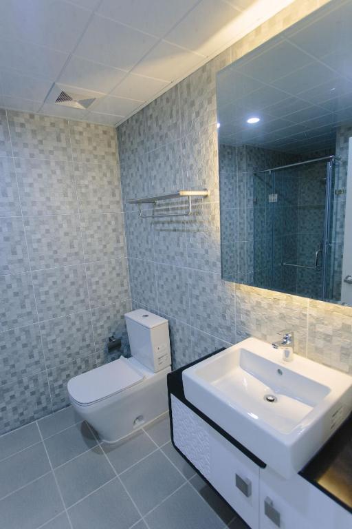 Koupelna v ubytování CA&SA Serviced Apartment