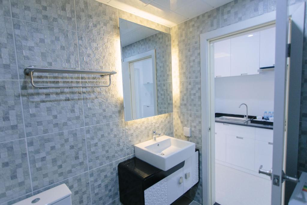 Koupelna v ubytování CA&SA Serviced Apartment
