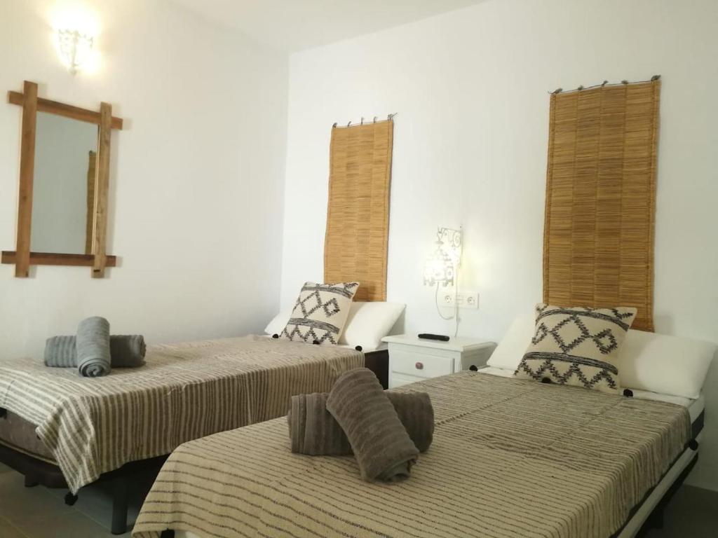 Postel nebo postele na pokoji v ubytování Casita Bonita Old Town Marbella