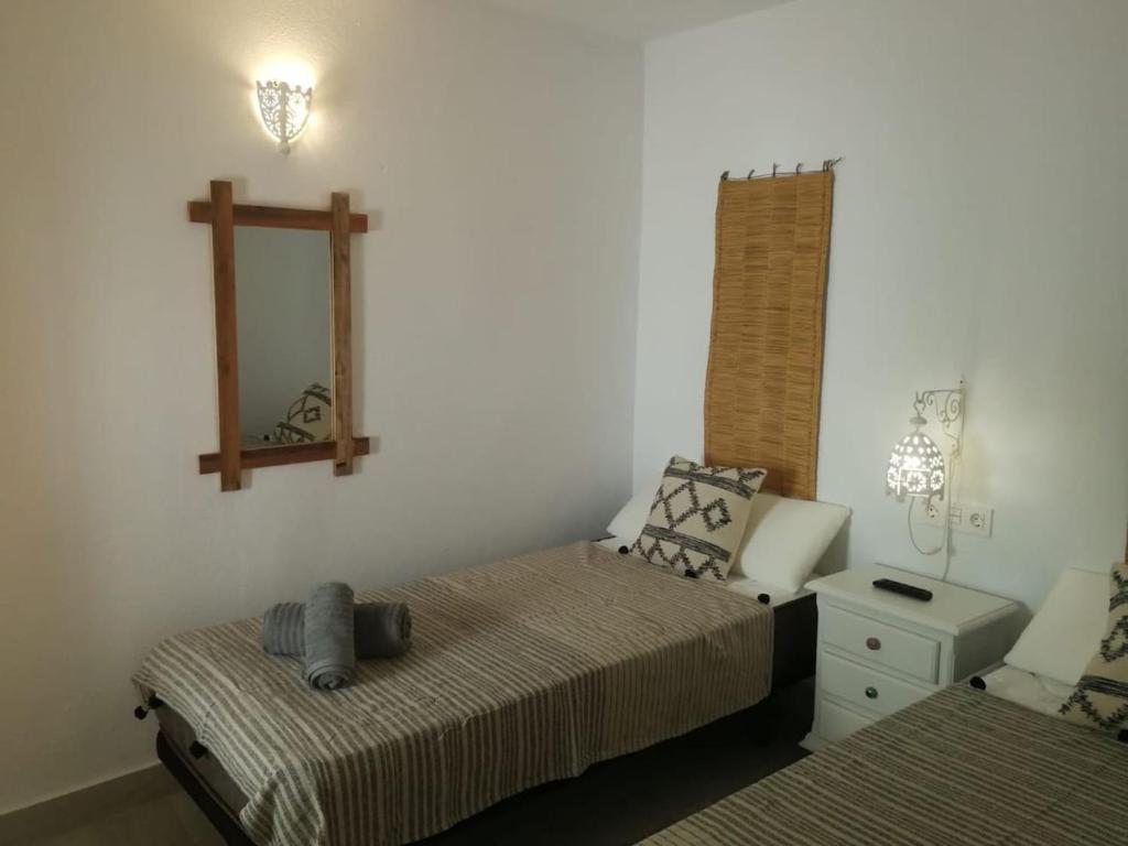 Postel nebo postele na pokoji v ubytování Casita Bonita Old Town Marbella